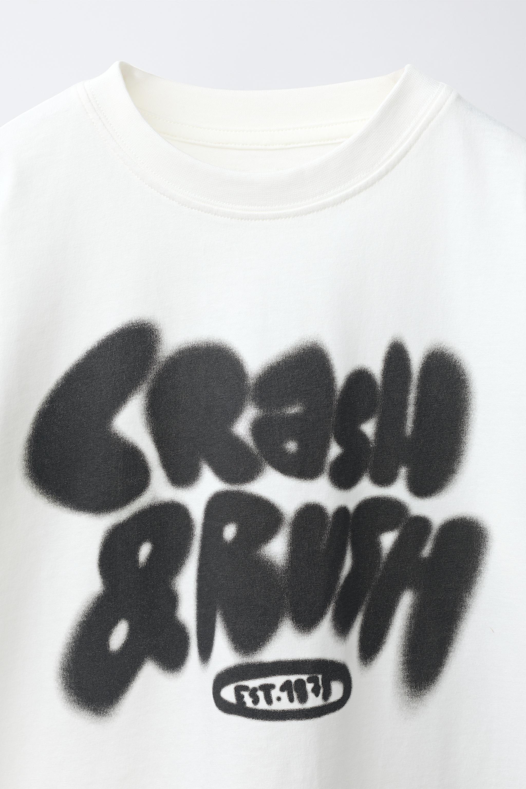 T-SHIRT IMPRIMÉ GRAFFITI